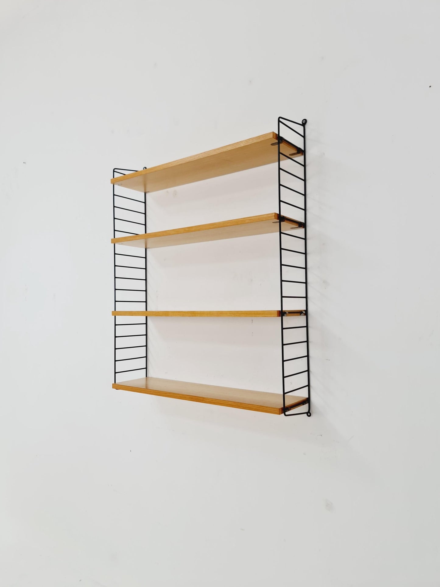 Original MCM Ash shelving system - consists of Black lacquered metal ladders, from string Stockholm 1960s