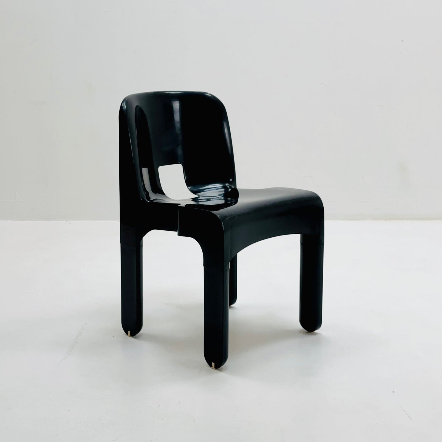 Space age Universale plastic black chair model 4867 ,designed by Joe Colombo for Kartell Italy. 1970s