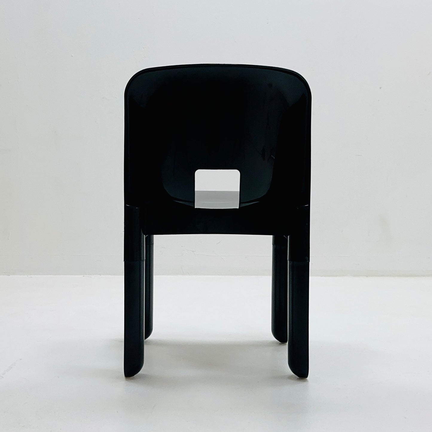 Space age Universale plastic black chair model 4867 ,designed by Joe Colombo for Kartell Italy. 1970s
