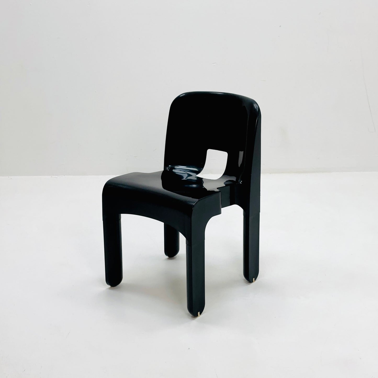 Space age Universale plastic black chair model 4867 ,designed by Joe Colombo for Kartell Italy. 1970s