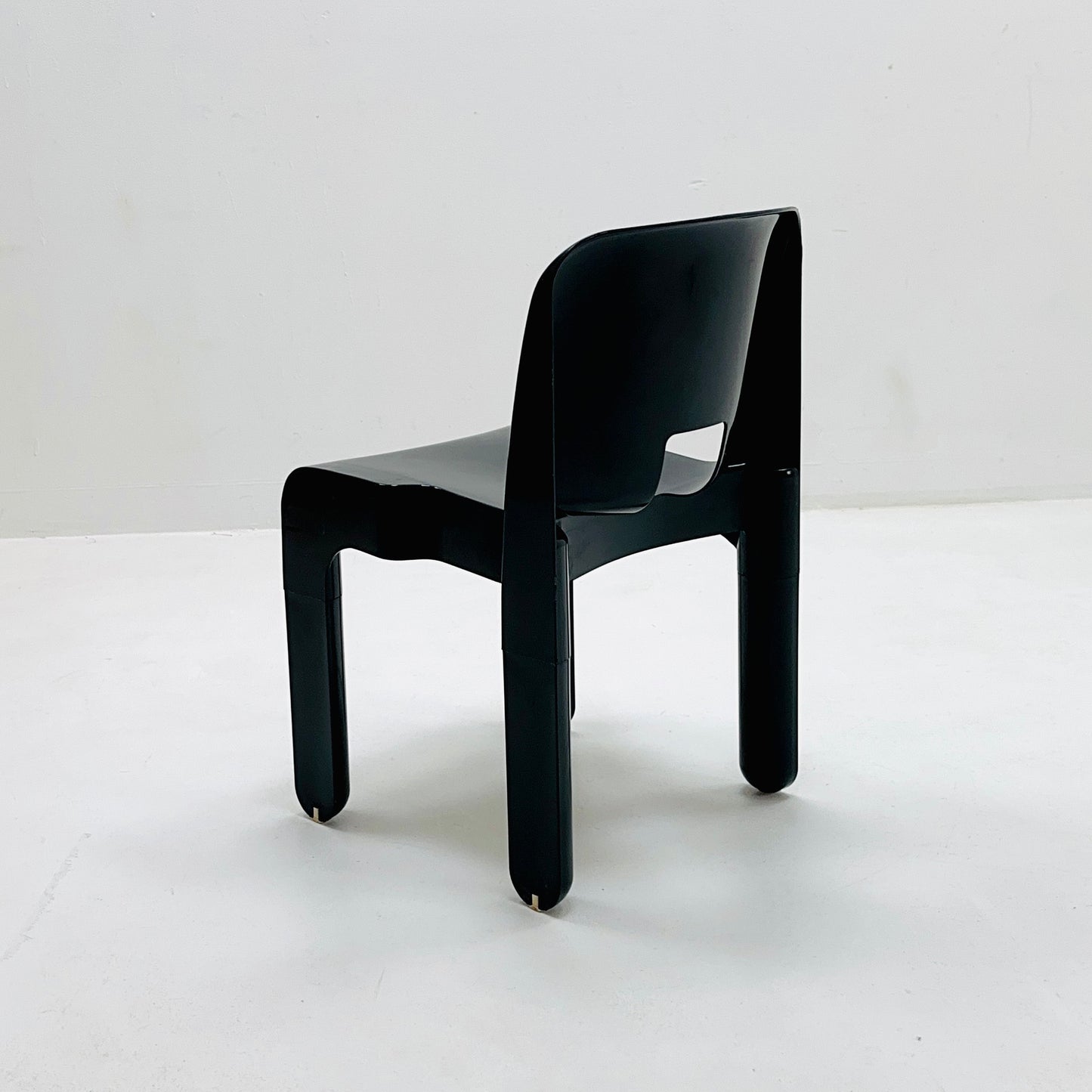 Space age Universale plastic black chair model 4867 ,designed by Joe Colombo for Kartell Italy. 1970s