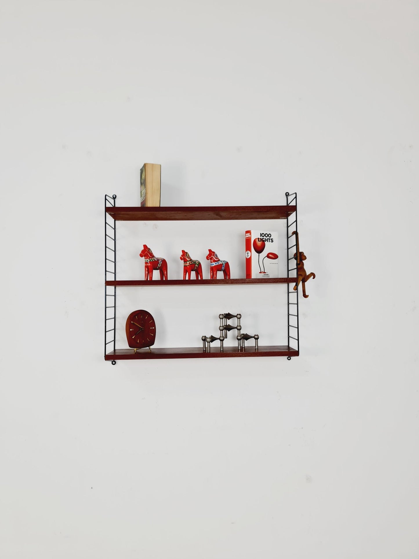 Original MCM Teak shelving system - consists of black lacquered metal ladders, from string Stockholm 1960s