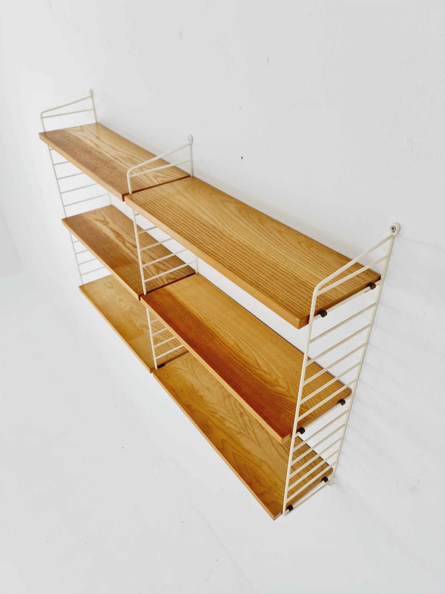 Original MCM Ash shelving system - consists of Black lacquered metal ladders, from string Stockholm 1960s