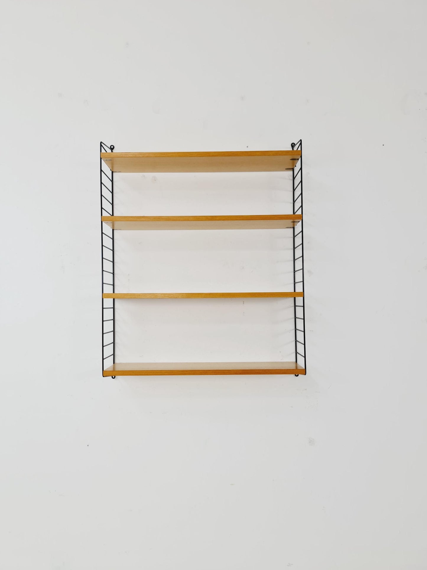 Original MCM Ash shelving system - consists of Black lacquered metal ladders, from string Stockholm 1960s
