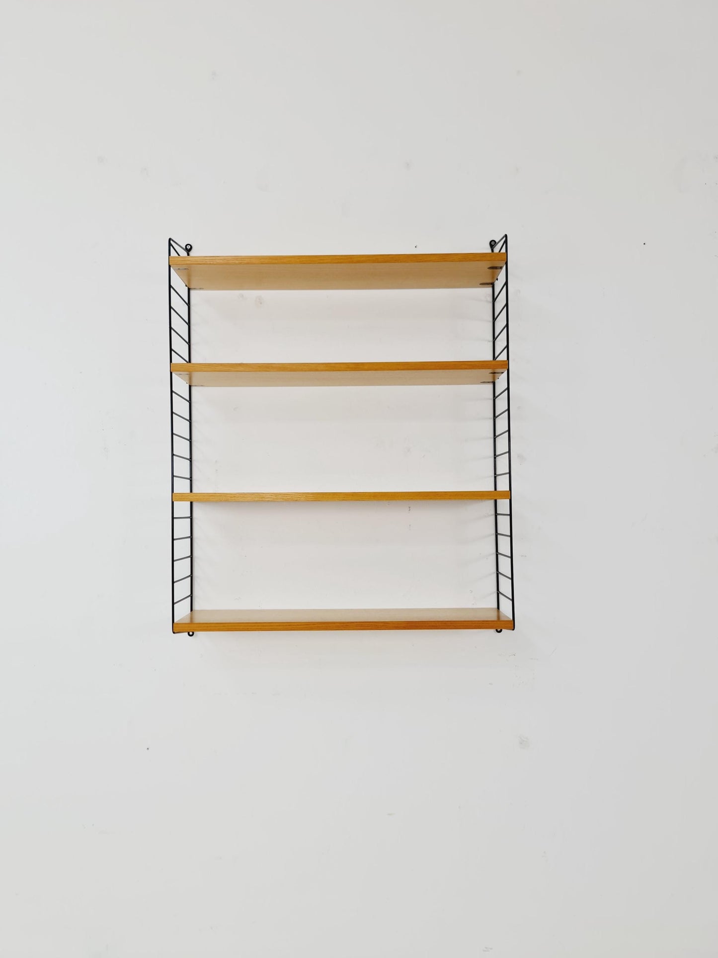Original MCM Ash shelving system - consists of Black lacquered metal ladders, from string Stockholm 1960s