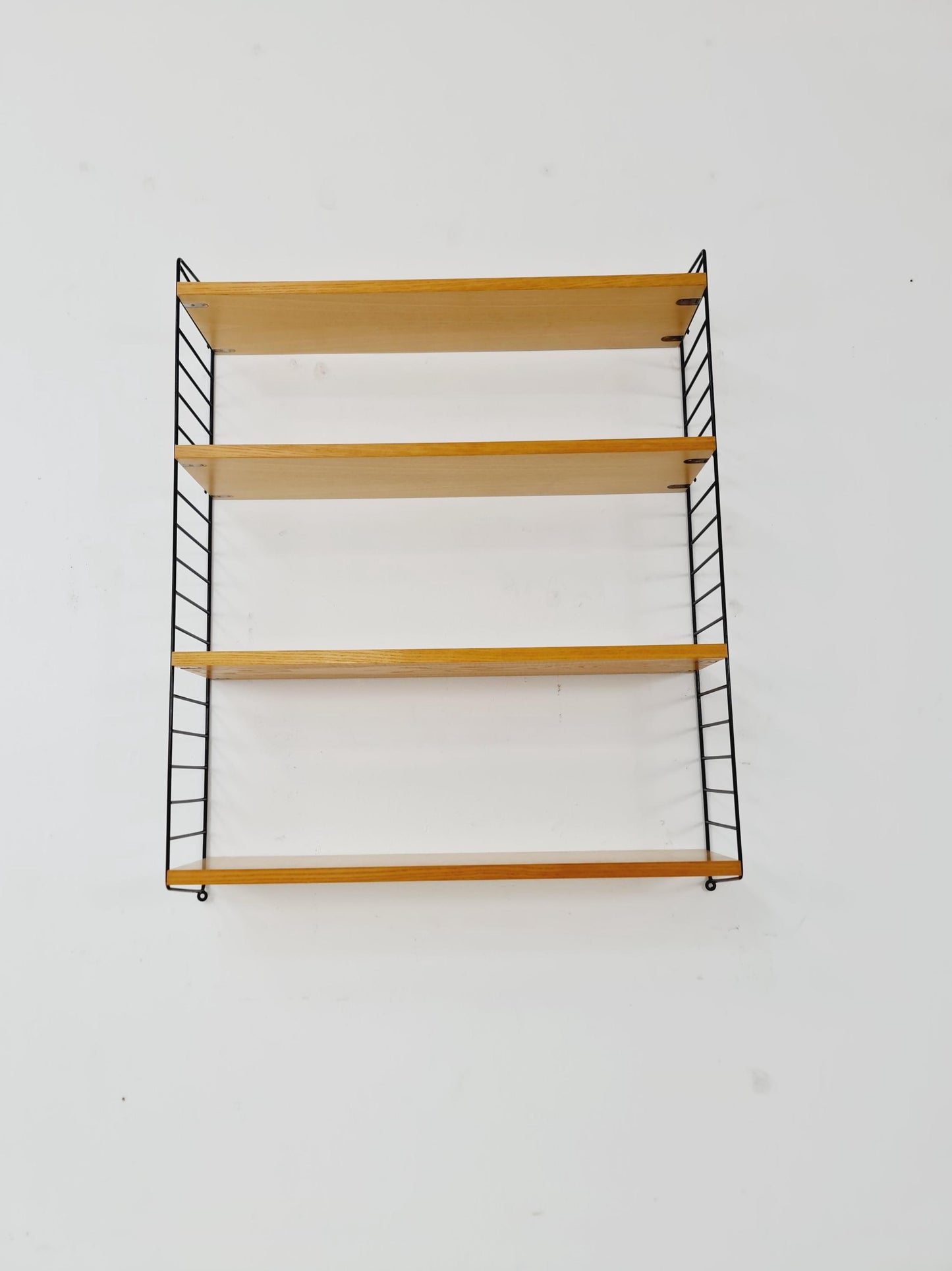 Original MCM Ash shelving system - consists of Black lacquered metal ladders, from string Stockholm 1960s