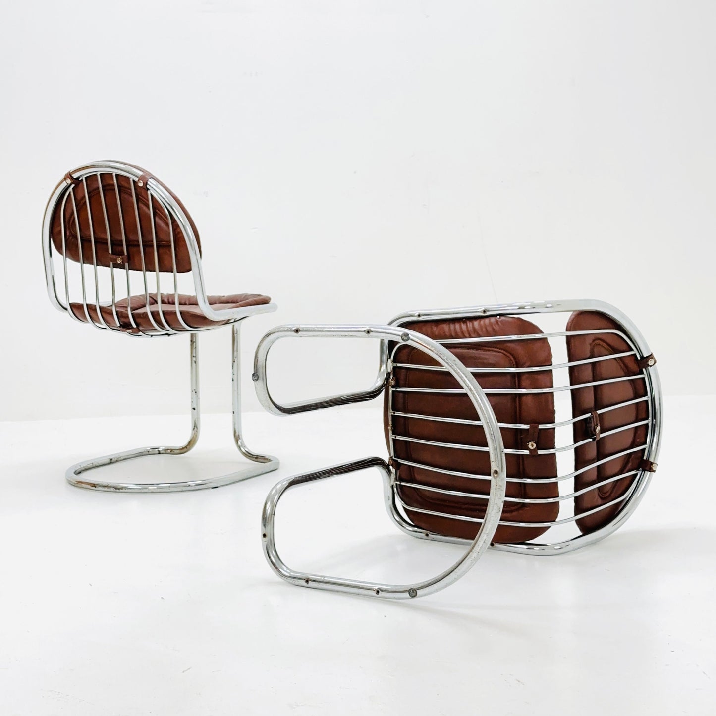 1 of 4 Mid century tubular Chrome and Leather Cantilever Dining Chairs, 1970s
