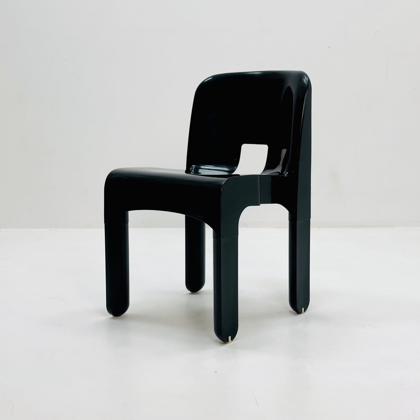 Space age Universale plastic black chair model 4867 ,designed by Joe Colombo for Kartell Italy. 1970s