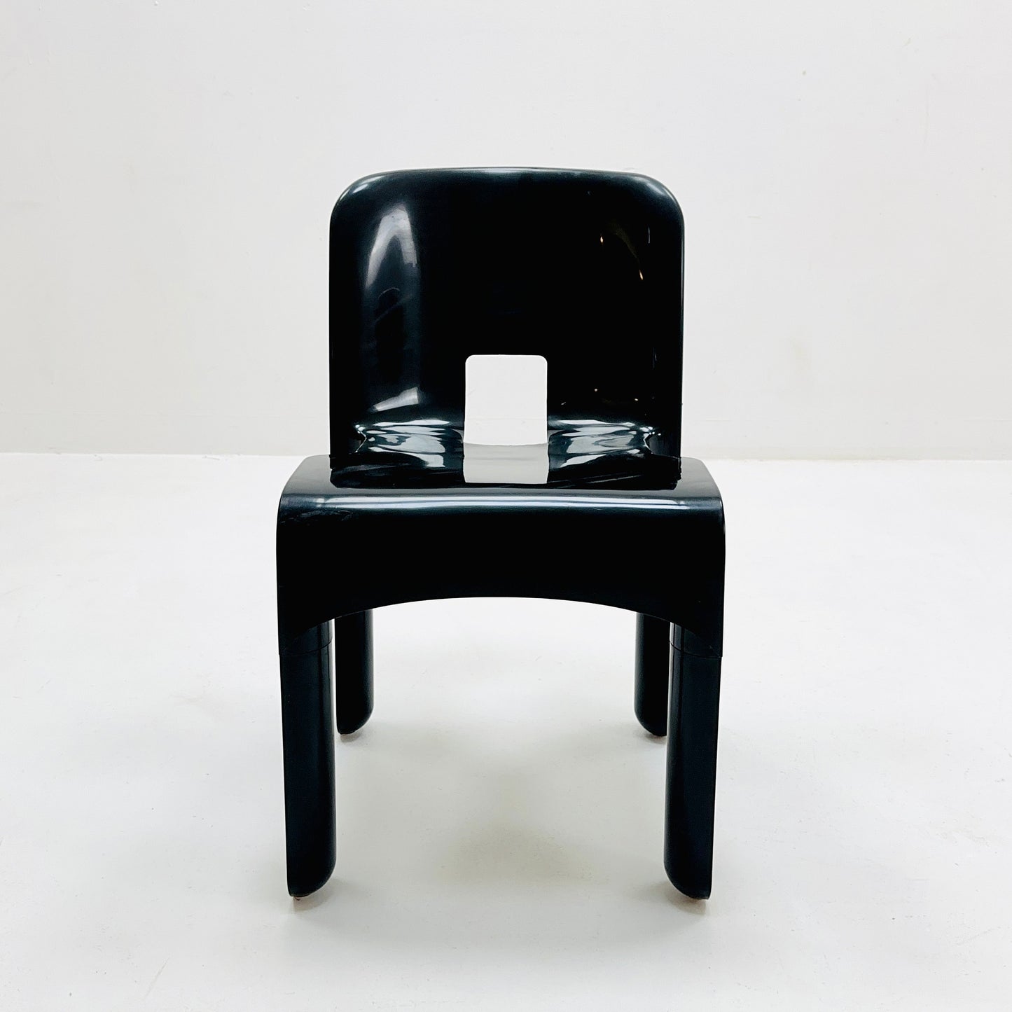 Space age Universale plastic black chair model 4867 ,designed by Joe Colombo for Kartell Italy. 1970s