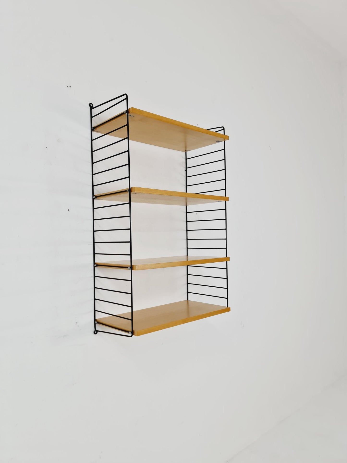 Original MCM Ash shelving system - consists of Black lacquered metal ladders, from string Stockholm 1960s