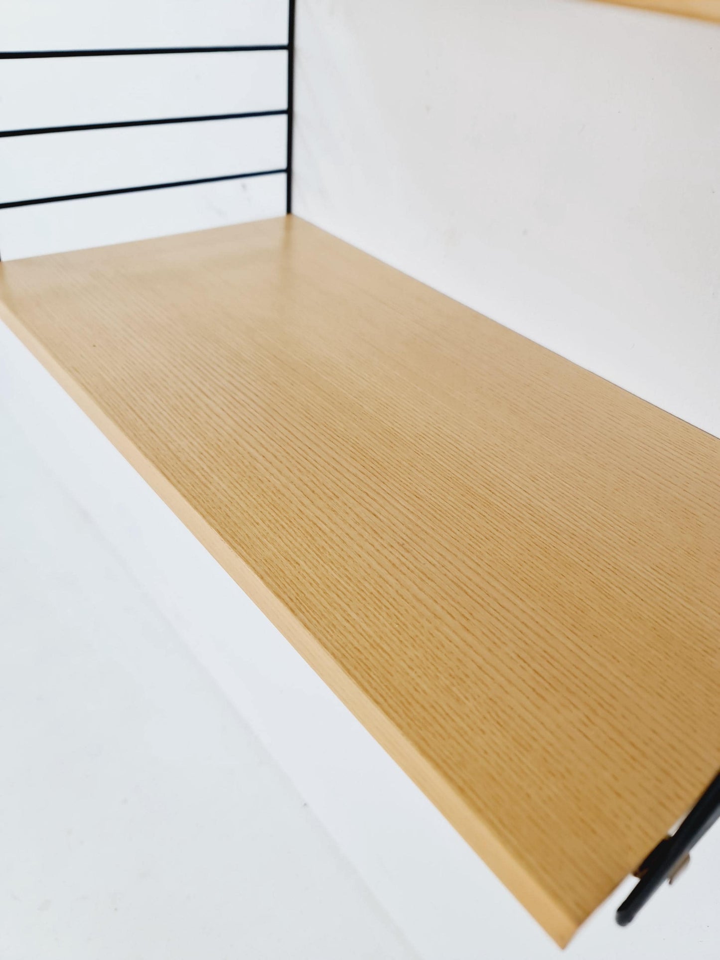 Original MCM Ash shelving system - consists of Black lacquered metal ladders, from string Stockholm 1960s