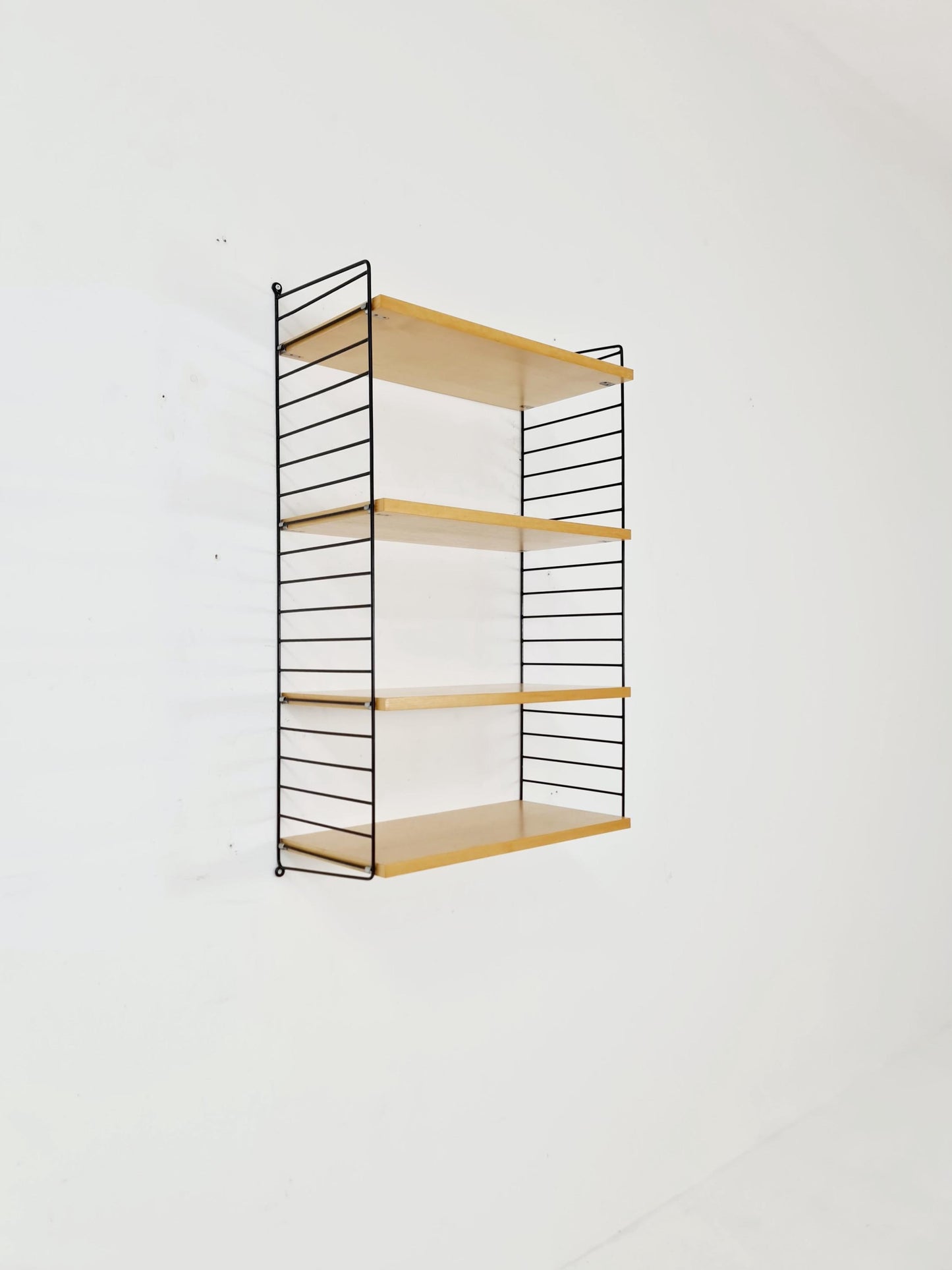 Original MCM Ash shelving system - consists of Black lacquered metal ladders, from string Stockholm 1960s