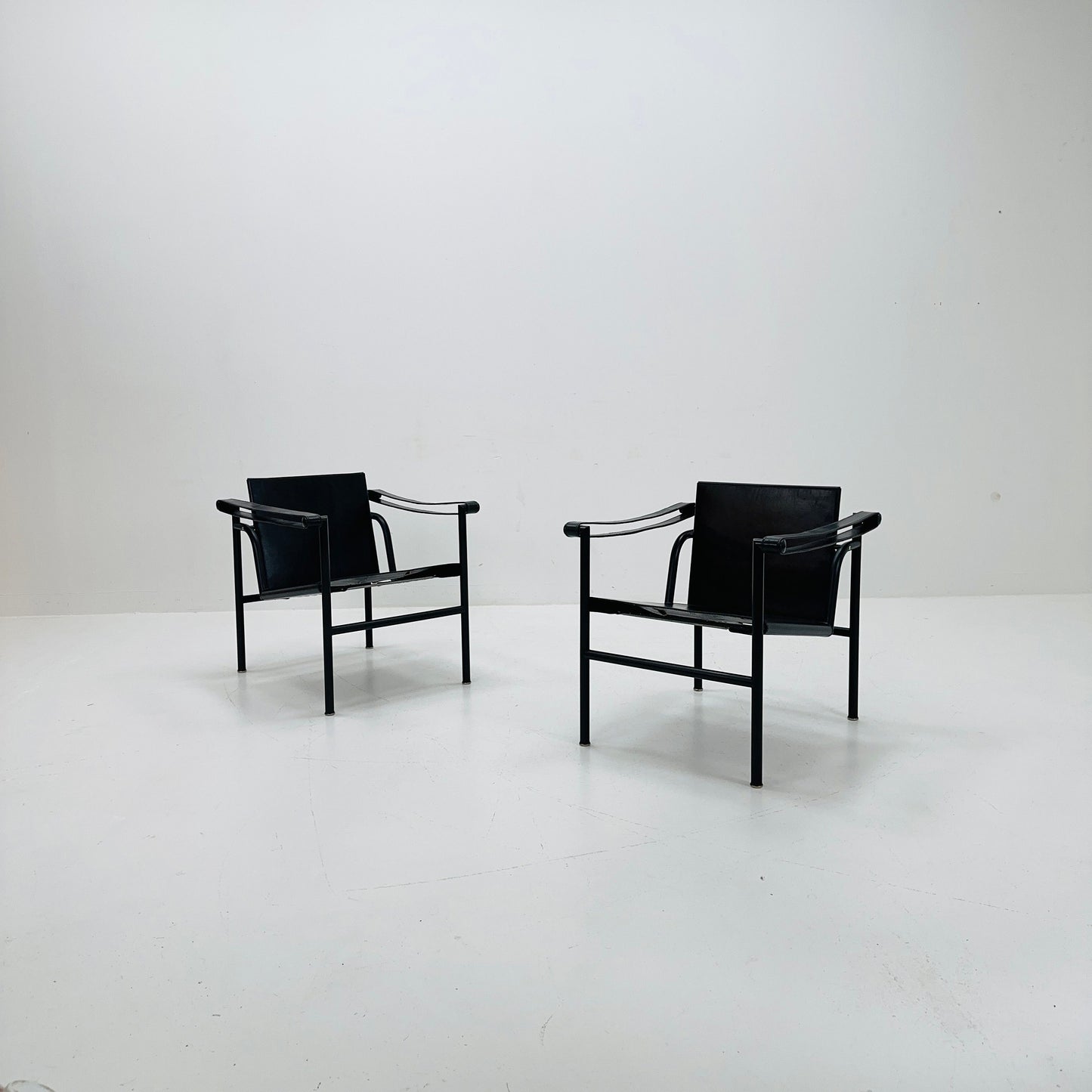 1 of 2 Lc 1 Mid century black edition armchair by Le Corbusier for Cassina Italy 1970s