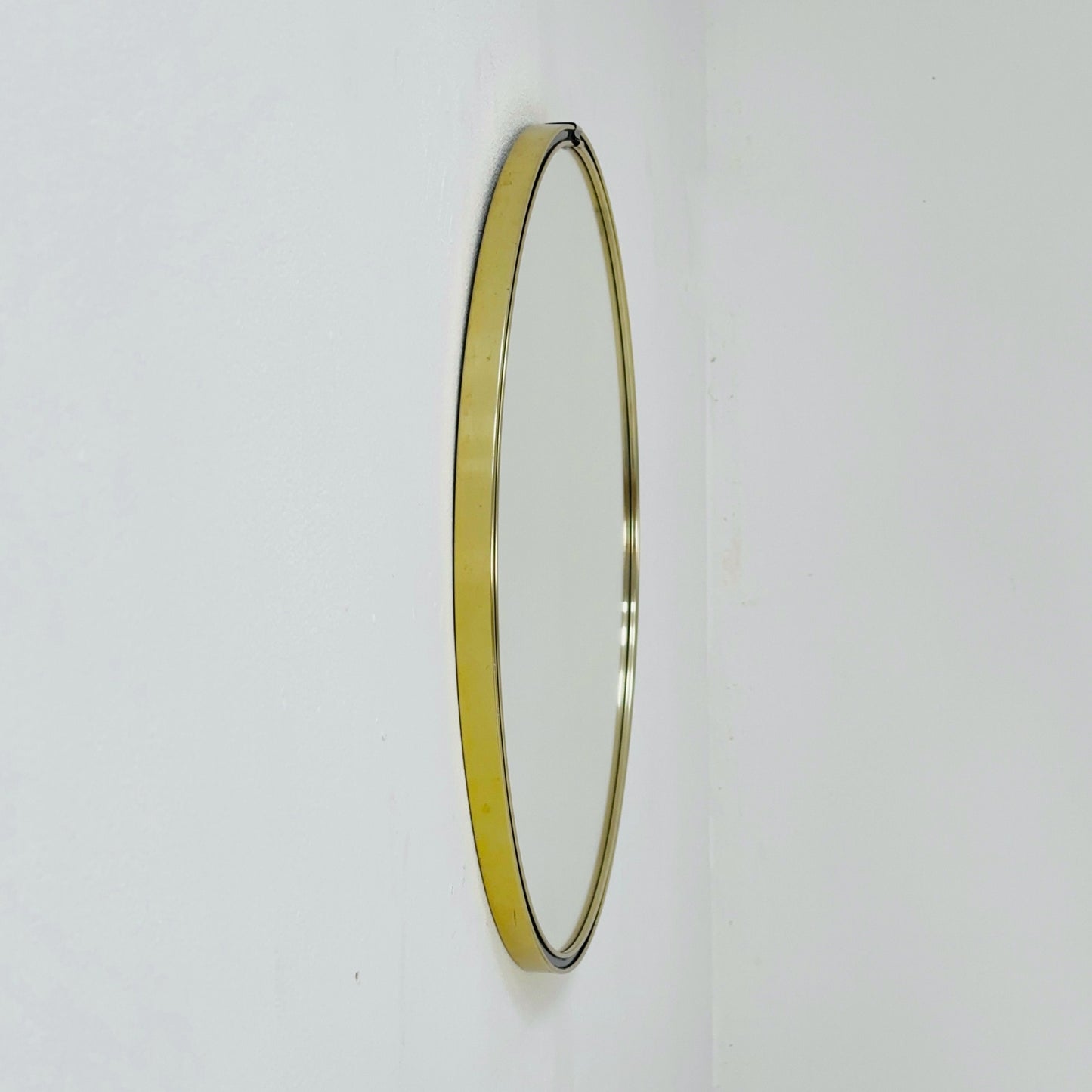 Mid century circle -shaped mirror with golden metal frame- 1960s