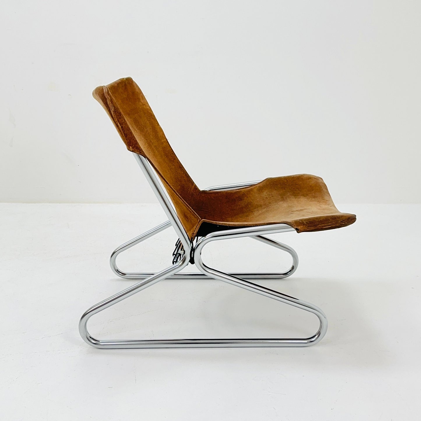 Mid century easy Sling Lounge Chair in alcantara Nubuck cognac leather by Lusch & Co West Germany 1980s