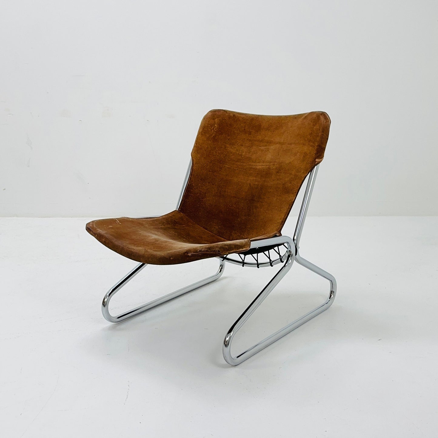 Mid century easy Sling Lounge Chair in alcantara Nubuck cognac leather by Lusch & Co West Germany 1980s