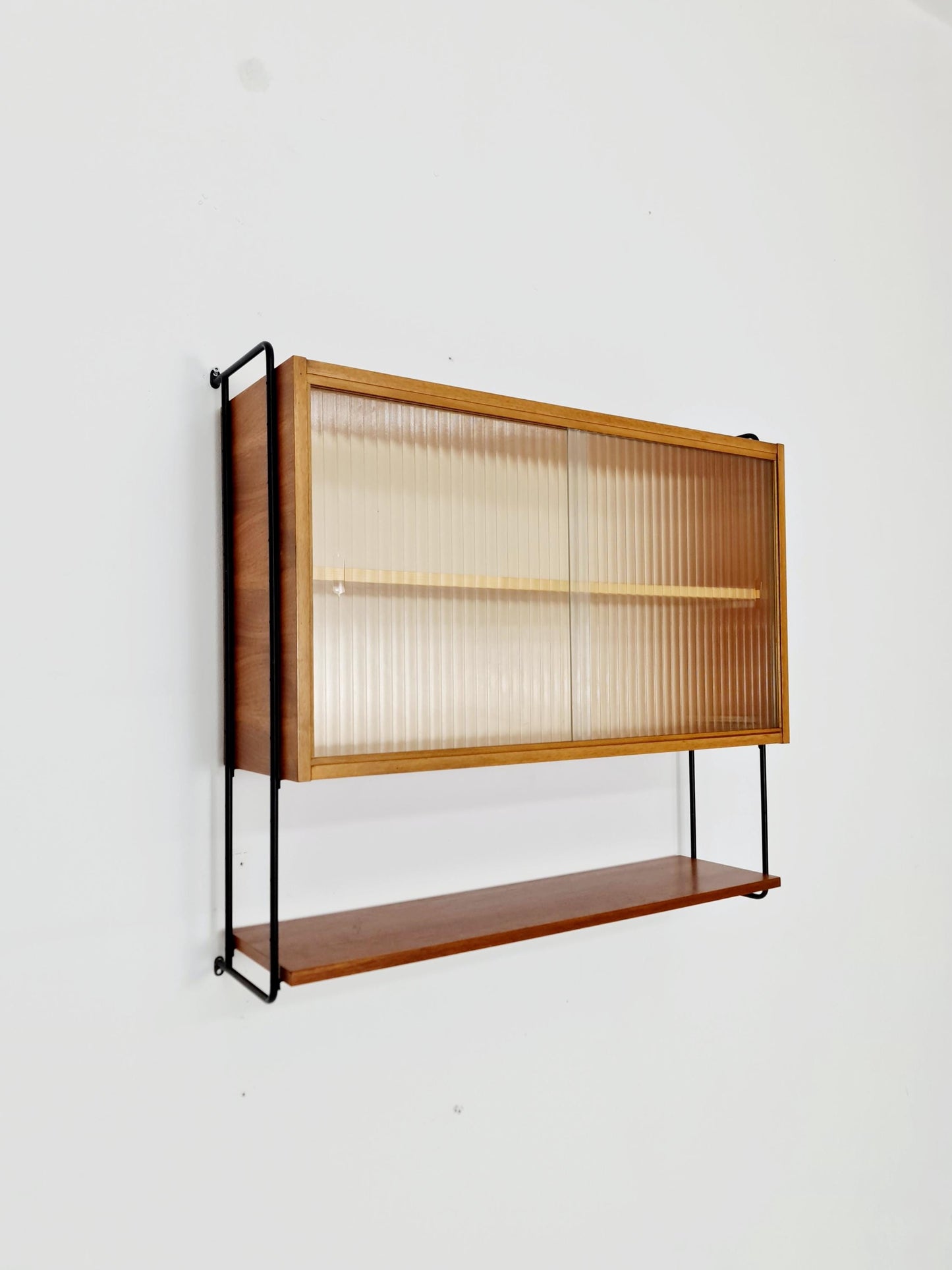 German Teak wall hanging display cabinet by Omnia Hilker, 1960s