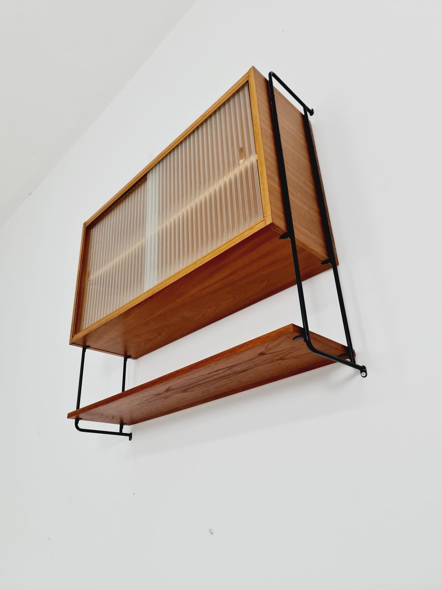 German Teak wall hanging display cabinet by Omnia Hilker, 1960s