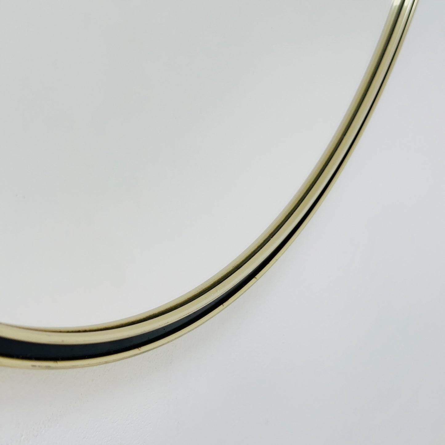 Mid century circle -shaped mirror with golden metal frame- 1960s