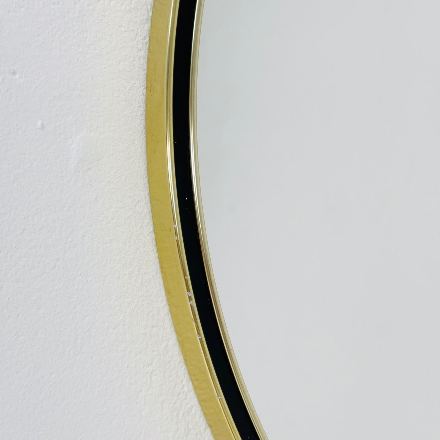 Mid century circle -shaped mirror with golden metal frame- 1960s