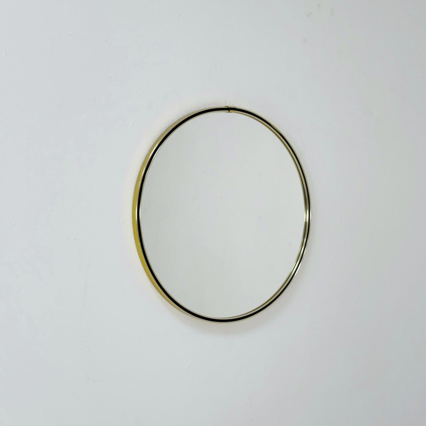 Mid century circle -shaped mirror with golden metal frame- 1960s