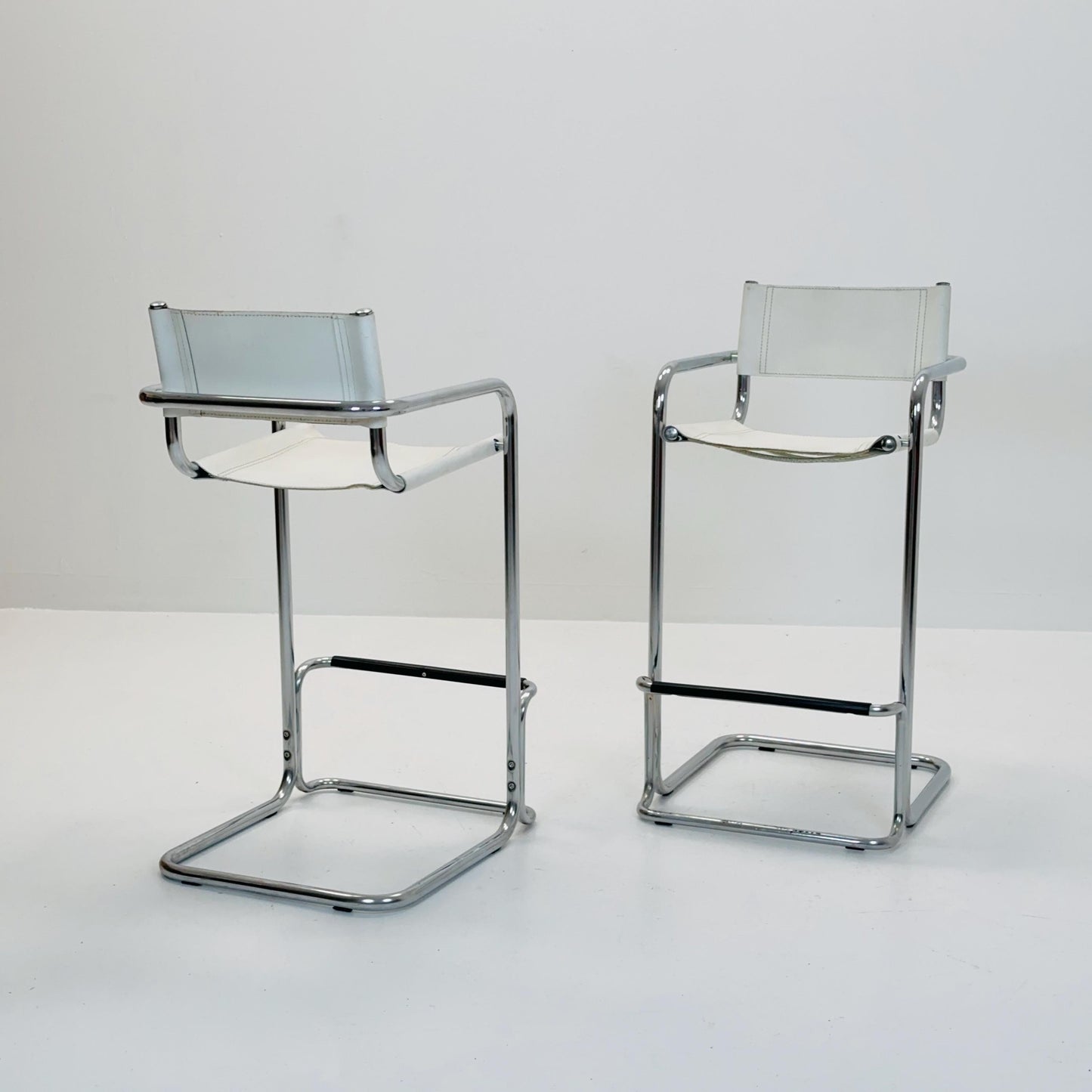 Set of 2 Mart Stam white leather and chrome Italian Mid-Century Modern barstools, 1970s