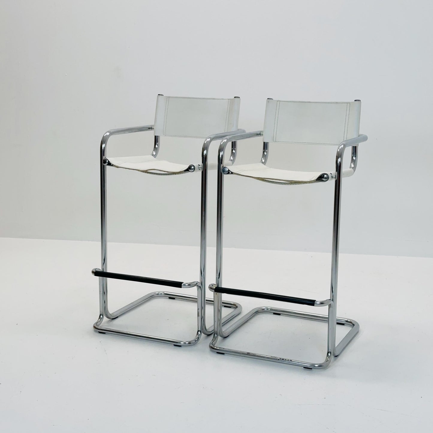 Set of 2 Mart Stam white leather and chrome Italian Mid-Century Modern barstools, 1970s