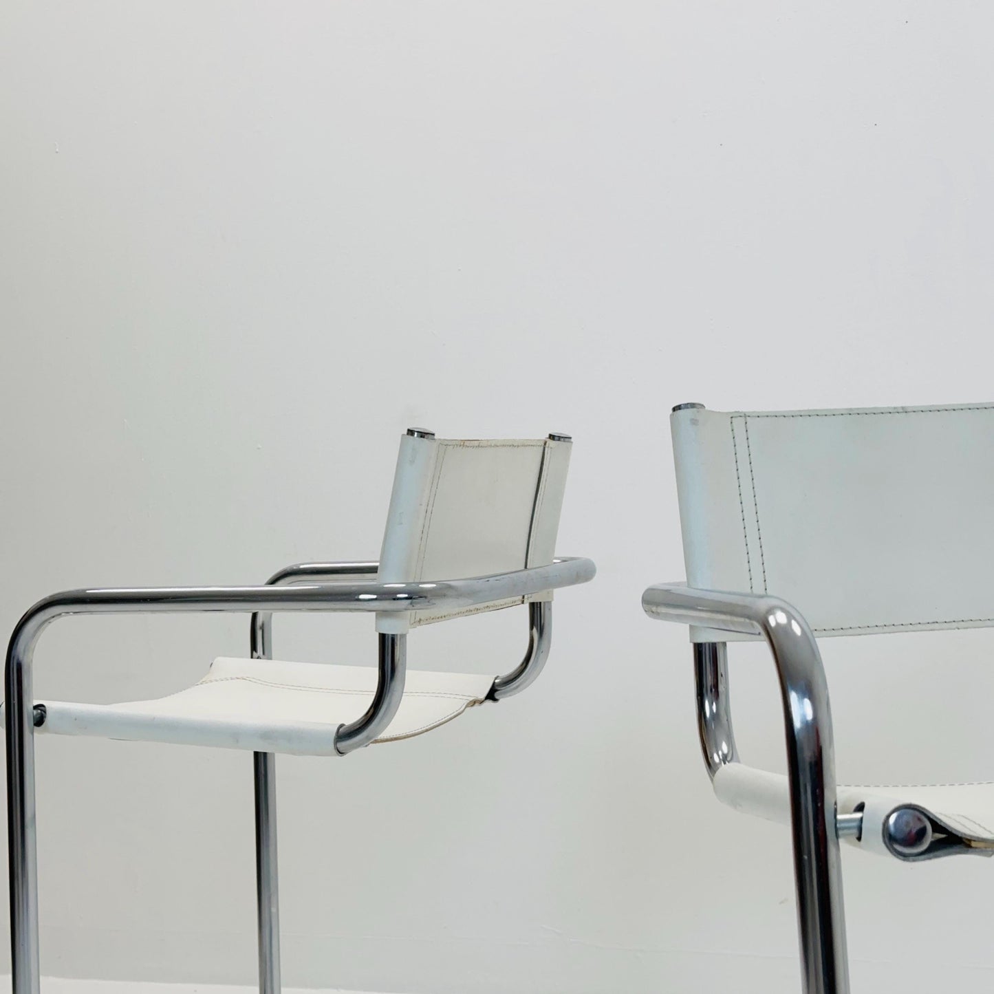 Set of 2 Mart Stam white leather and chrome Italian Mid-Century Modern barstools, 1970s