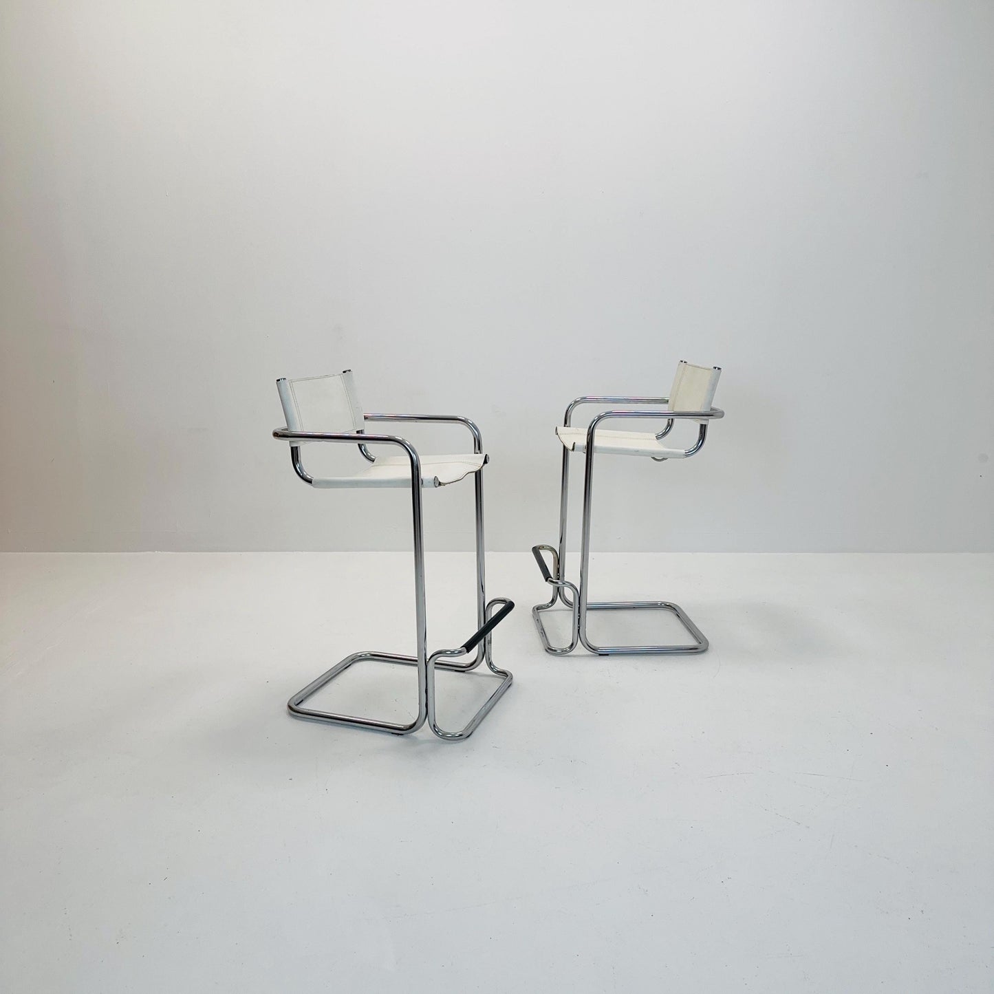 Set of 2 Mart Stam white leather and chrome Italian Mid-Century Modern barstools, 1970s