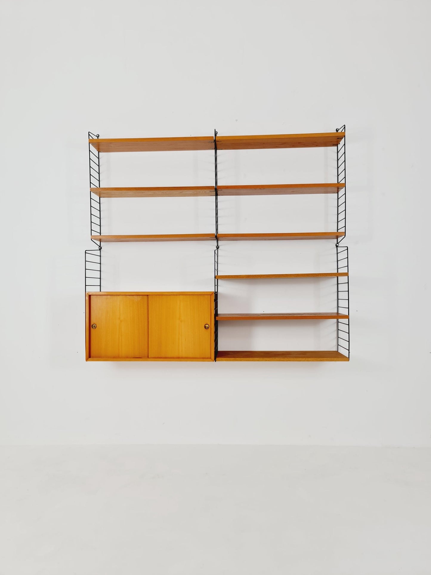 Wall-mounted original Swedish string shelf-system, drawers, bookcase Ash wood by Nils & Kajsa Strinning, 1960s