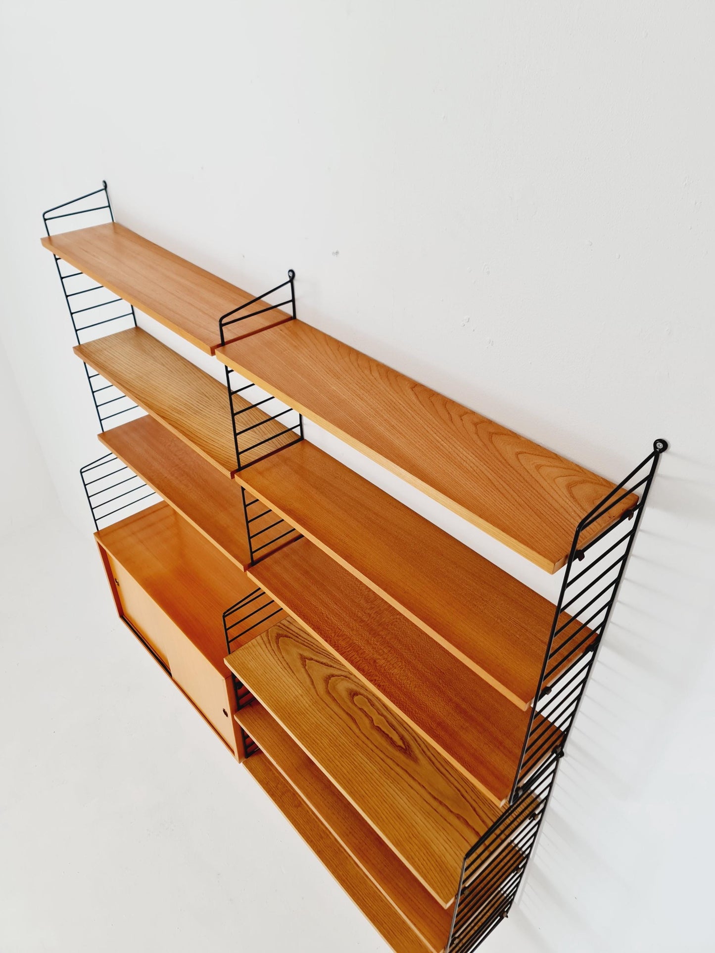 Wall-mounted original Swedish string shelf-system, drawers, bookcase Ash wood by Nils & Kajsa Strinning, 1960s