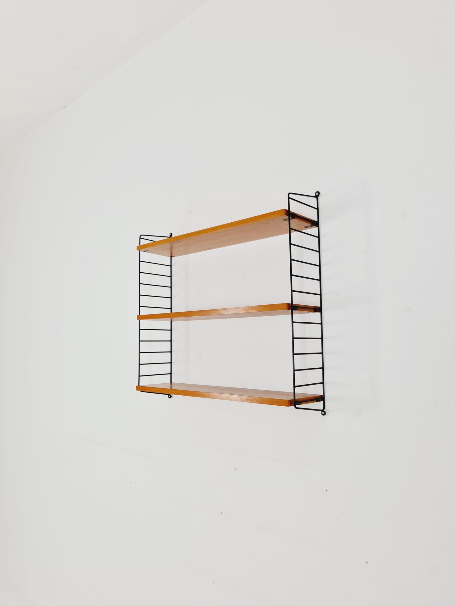 Original MCM Ash shelving system - consists of black lacquered metal ladders, from string Stockholm 1960s