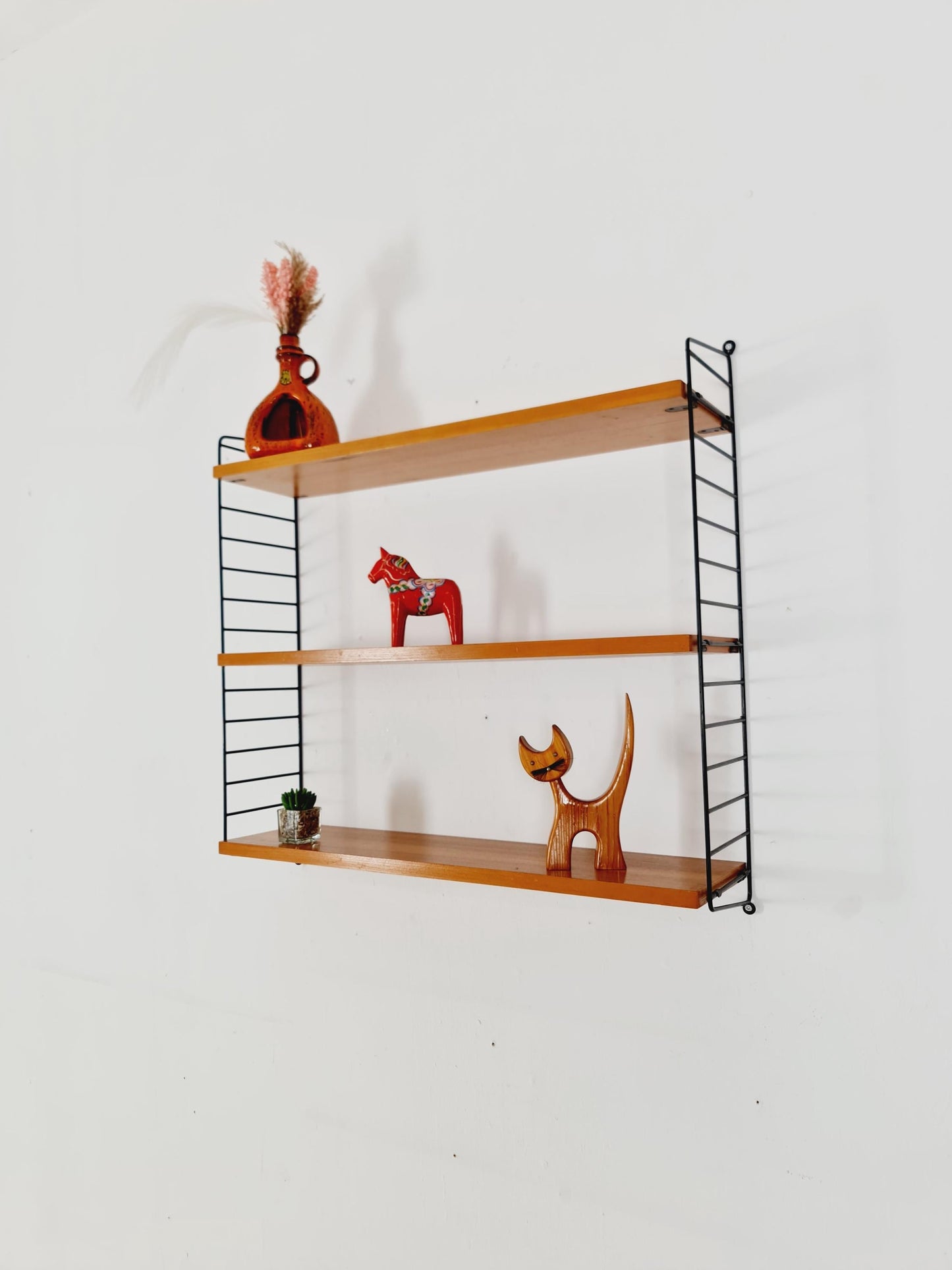 Original MCM Ash shelving system - consists of black lacquered metal ladders, from string Stockholm 1960s
