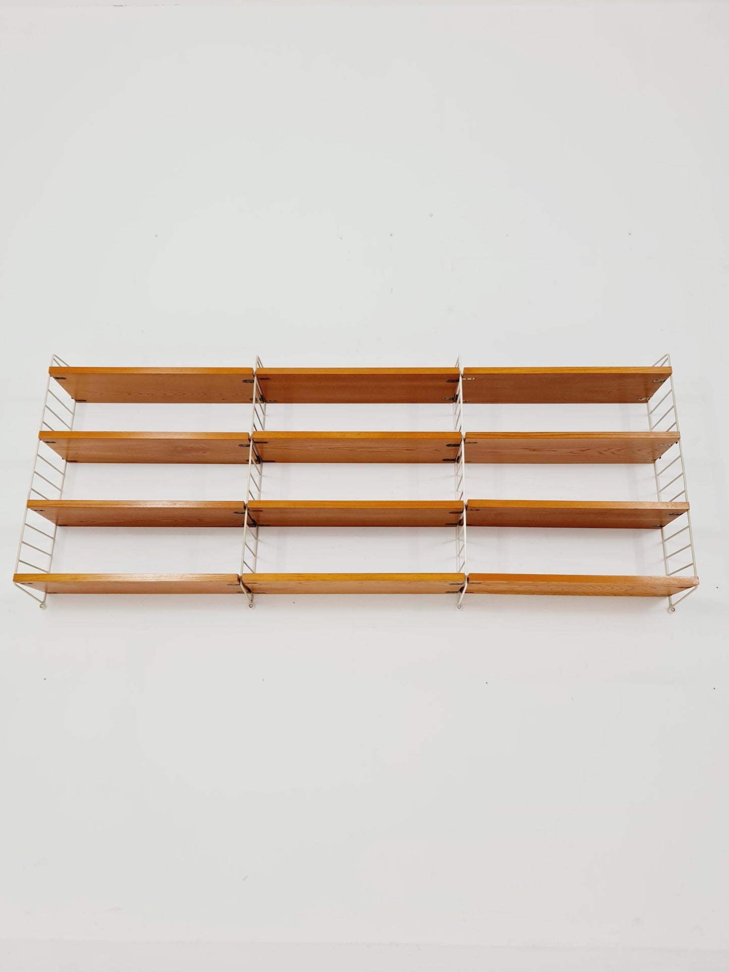 Original MCM Ash shelving system - consists of Black lacquered metal ladders, from string Stockholm 1960s