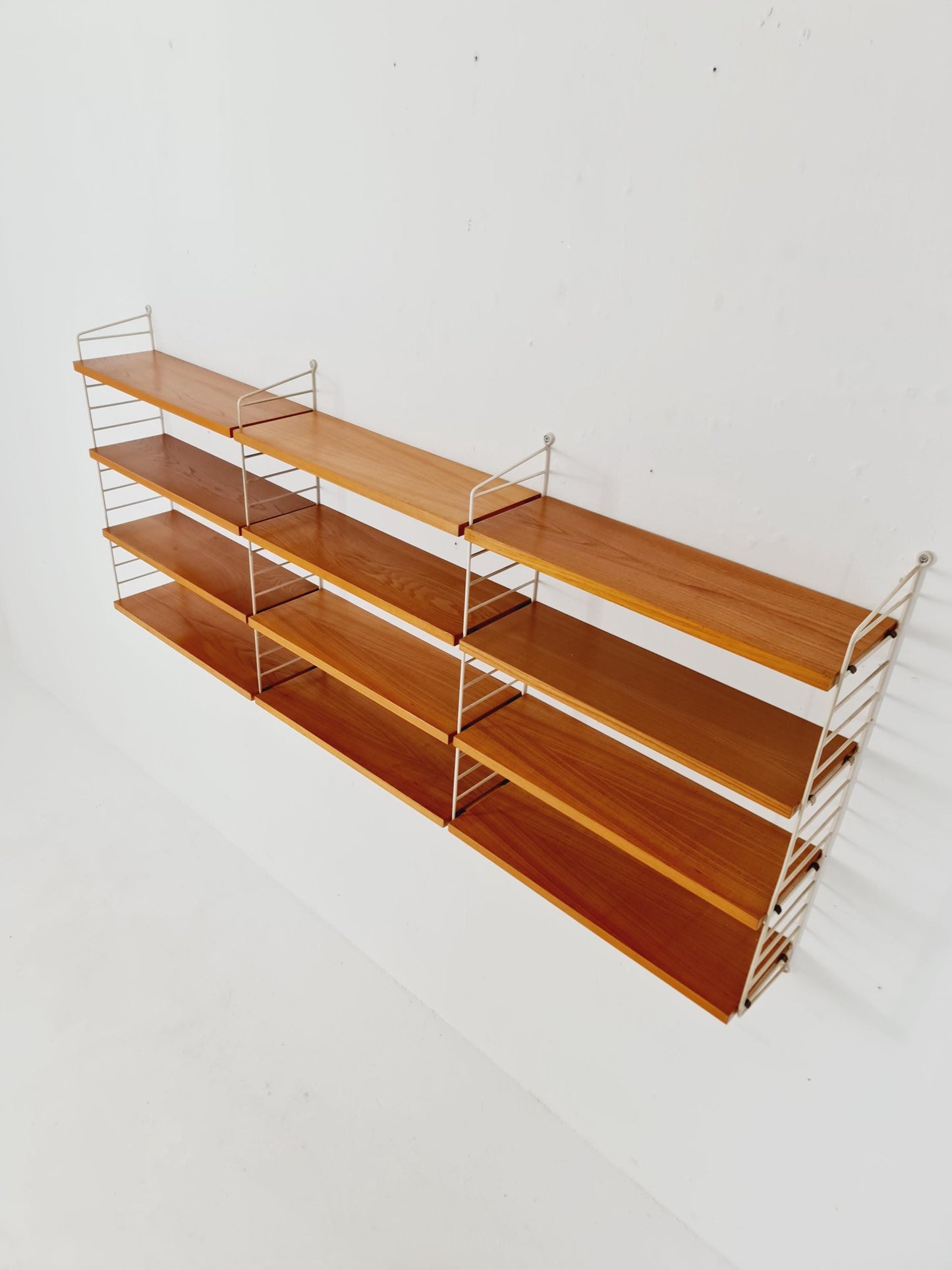 Original MCM Ash shelving system - consists of Black lacquered metal ladders, from string Stockholm 1960s