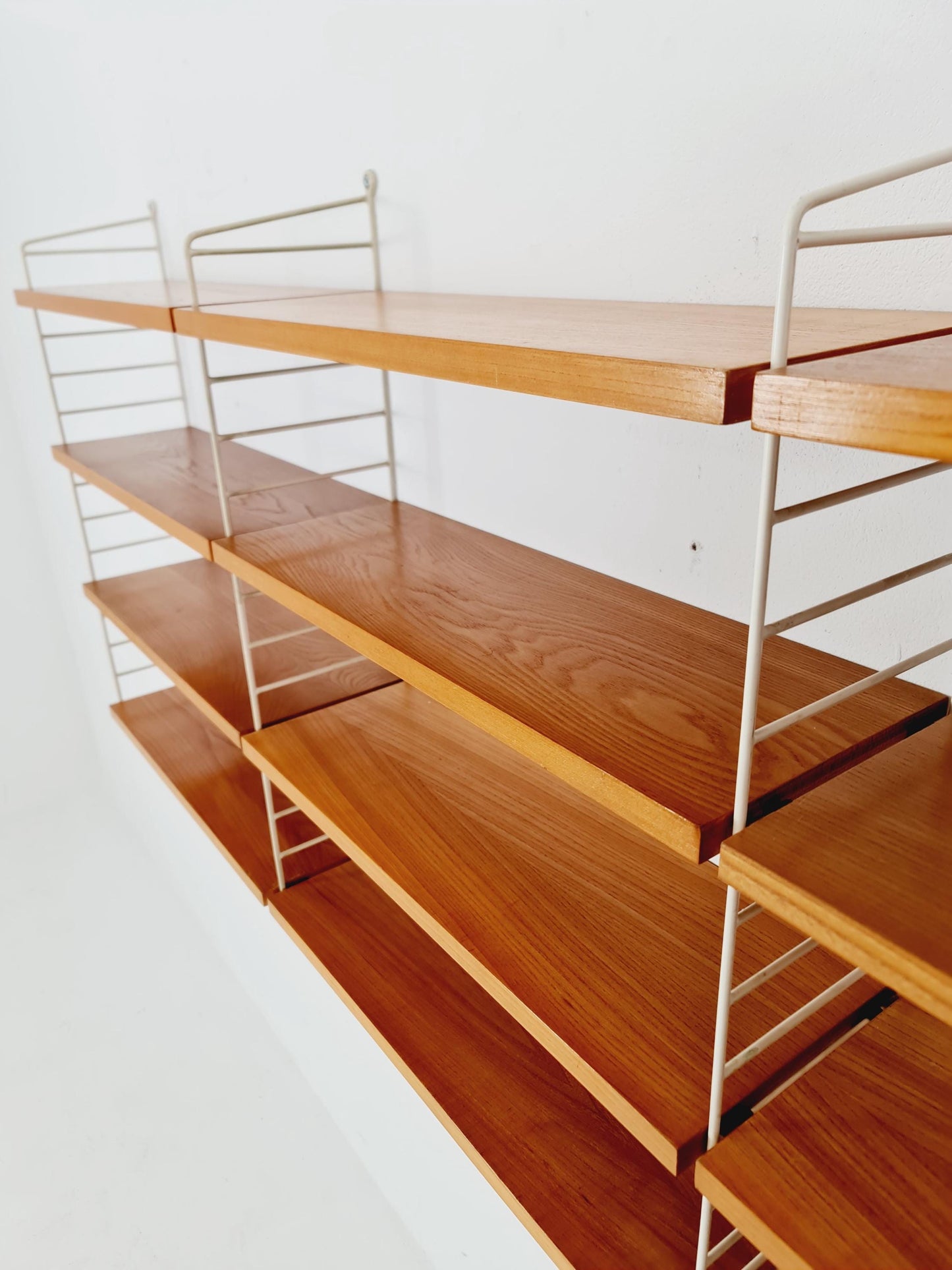 Original MCM Ash shelving system - consists of Black lacquered metal ladders, from string Stockholm 1960s