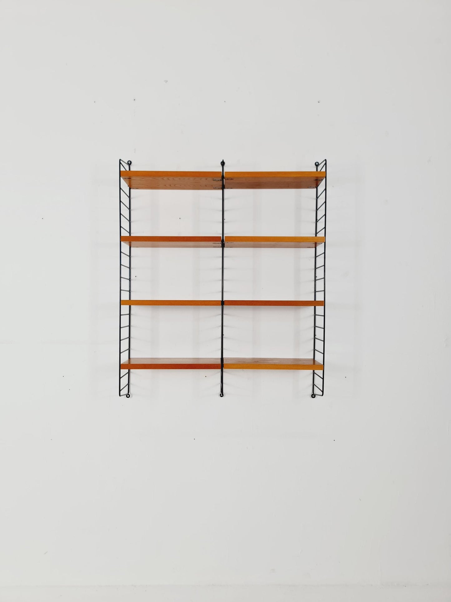 Original MCM Ash shelving system - consists of black lacquered metal ladders, from string Stockholm 1960s