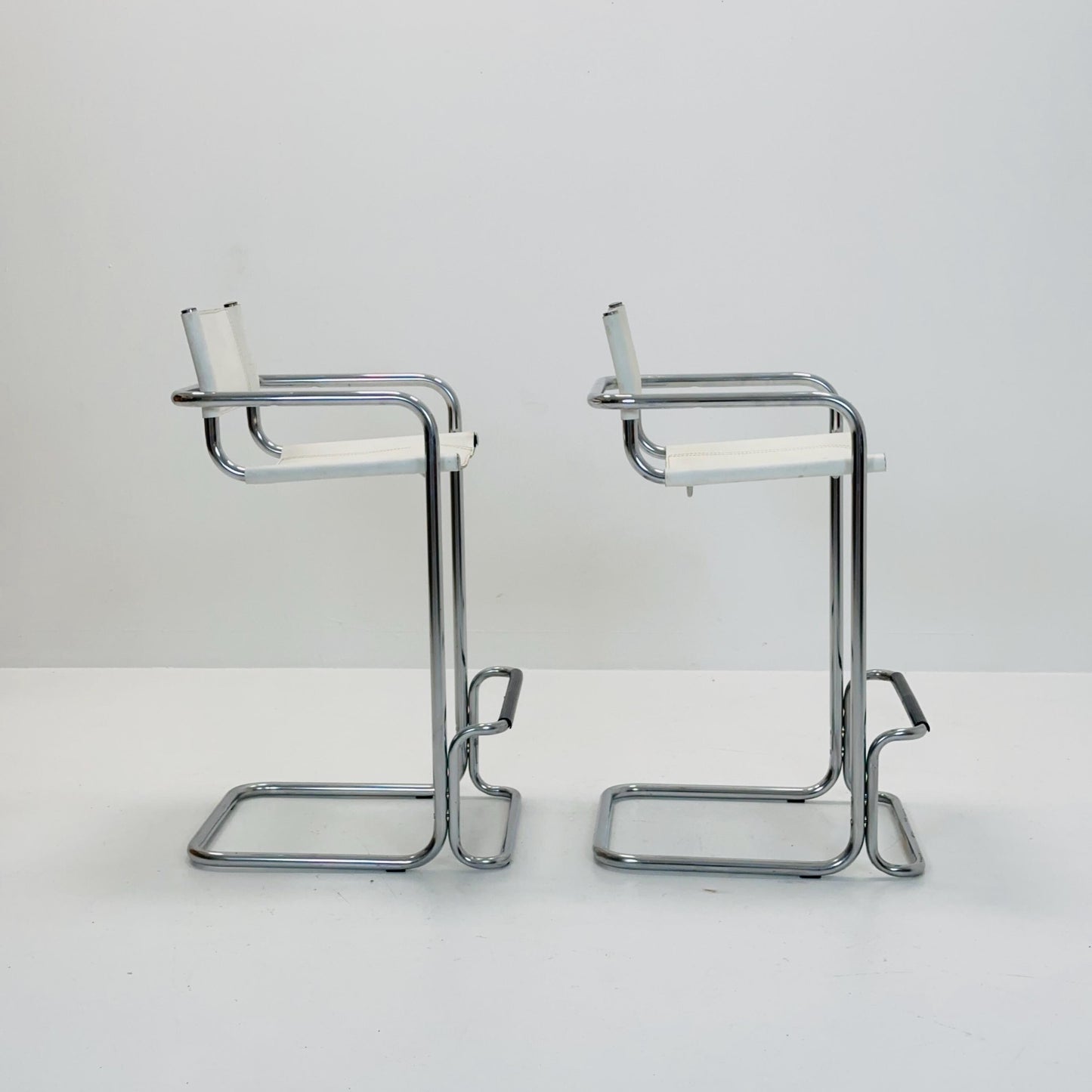 Set of 2 Mart Stam white leather and chrome Italian Mid-Century Modern barstools, 1970s