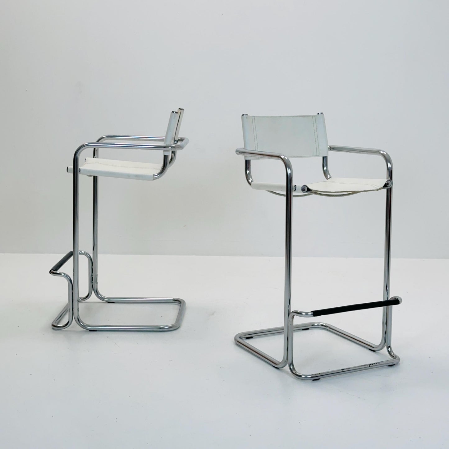 Set of 2 Mart Stam white leather and chrome Italian Mid-Century Modern barstools, 1970s