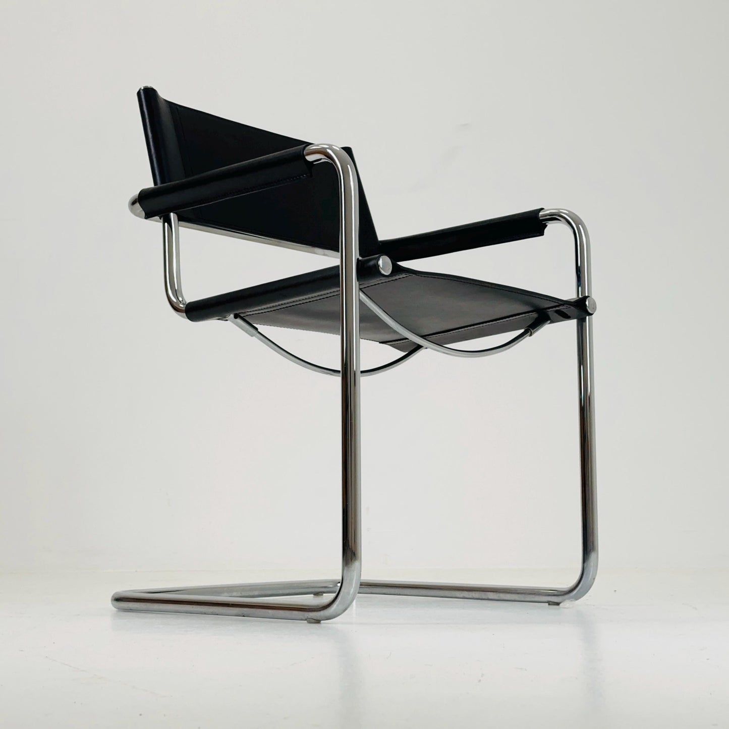 1 of 2 vintage B34 dark black color leather cantilevered chairs by Mart Stam for Jox Interni Italy 1980s