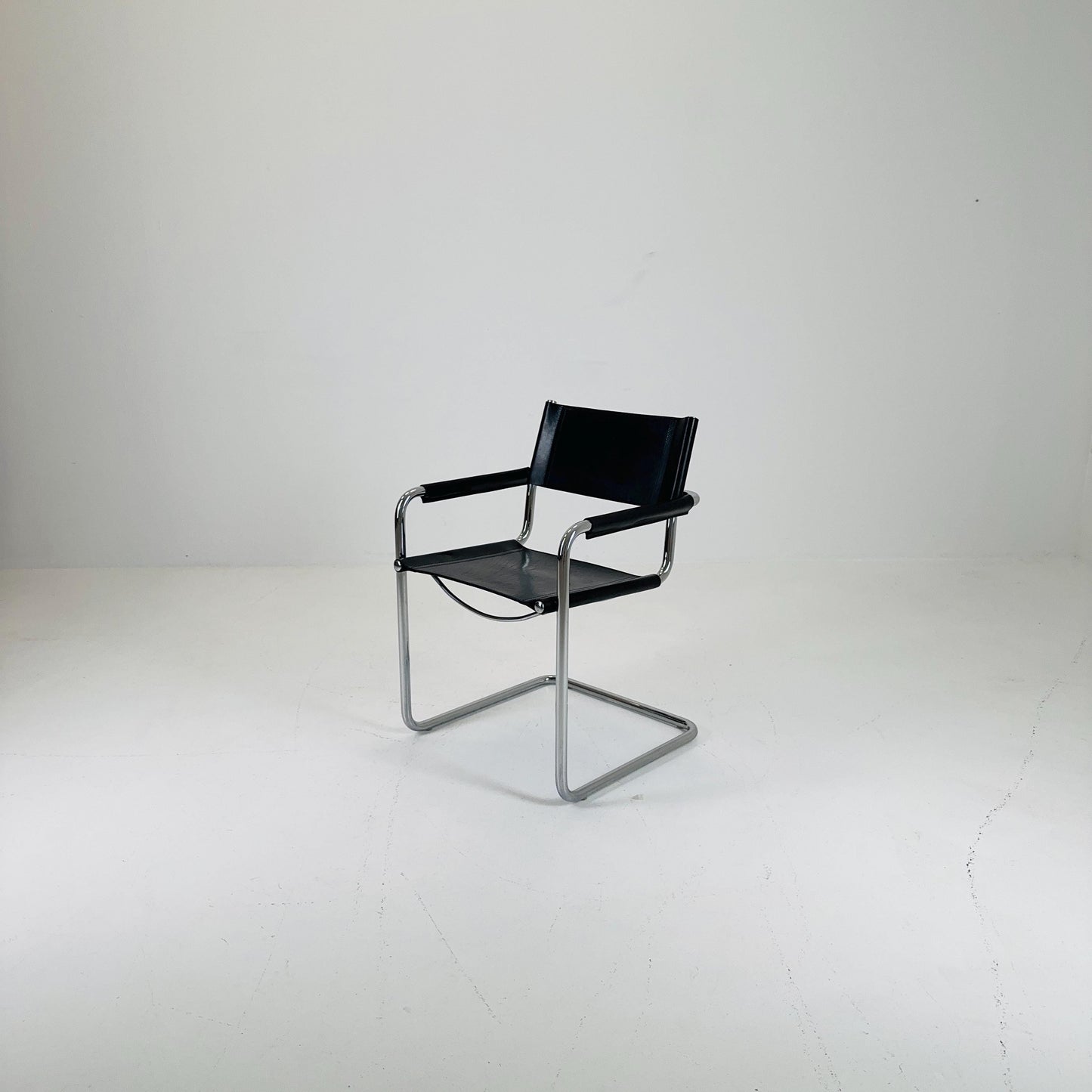 1 of 2 vintage B34 dark black color leather cantilevered chairs by Mart Stam for Jox Interni Italy 1980s