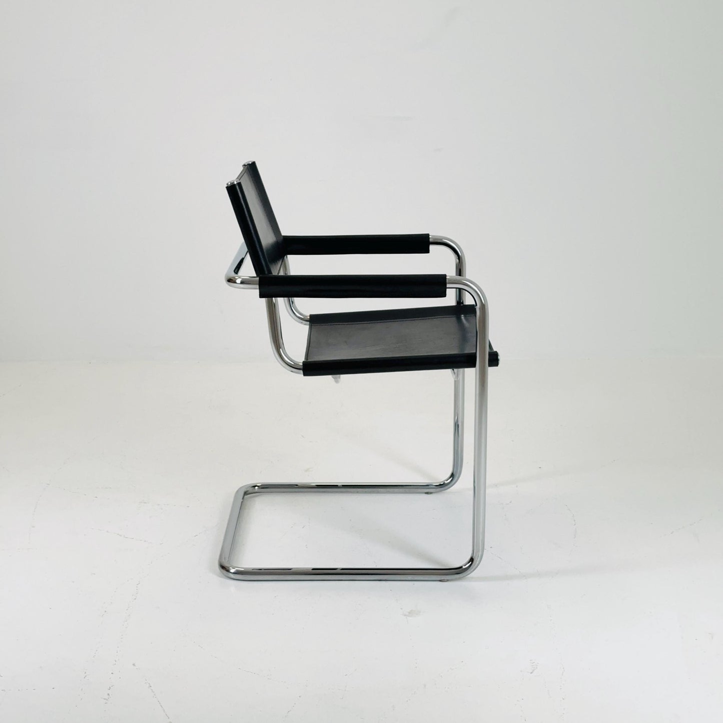 1 of 2 vintage B34 dark black color leather cantilevered chairs by Mart Stam for Jox Interni Italy 1980s