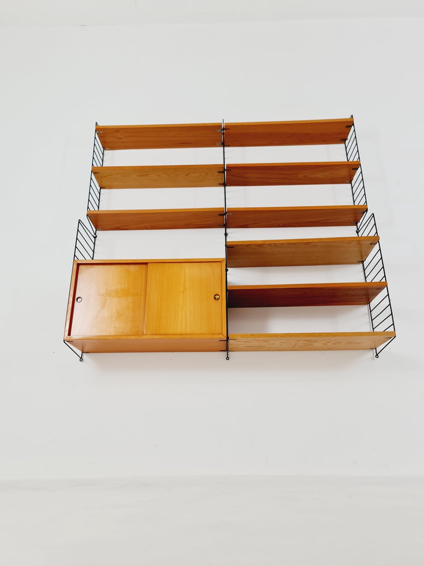 Wall-mounted original Swedish string shelf-system, drawers, bookcase Ash wood by Nils & Kajsa Strinning, 1960s