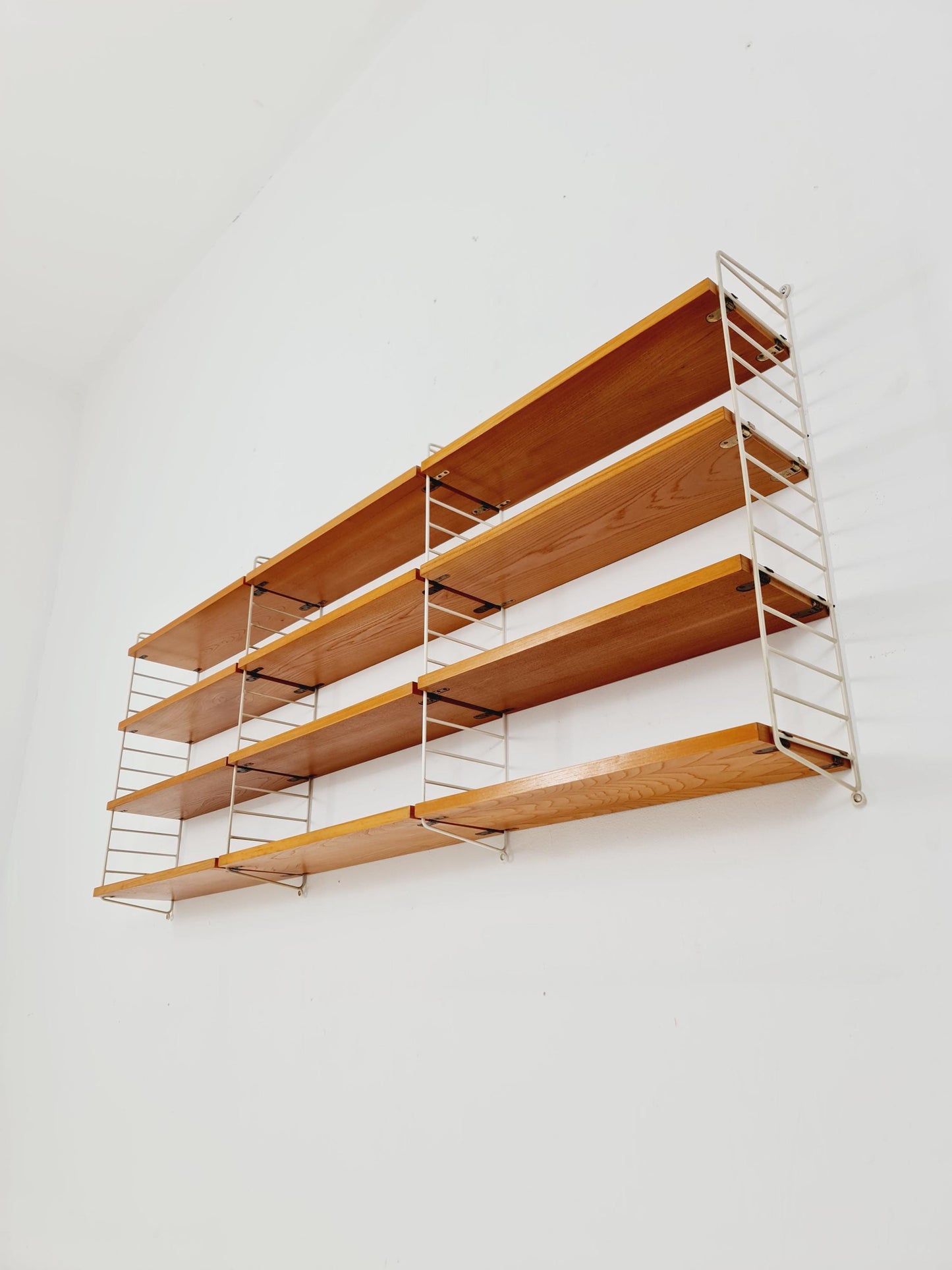 Original MCM Ash shelving system - consists of Black lacquered metal ladders, from string Stockholm 1960s