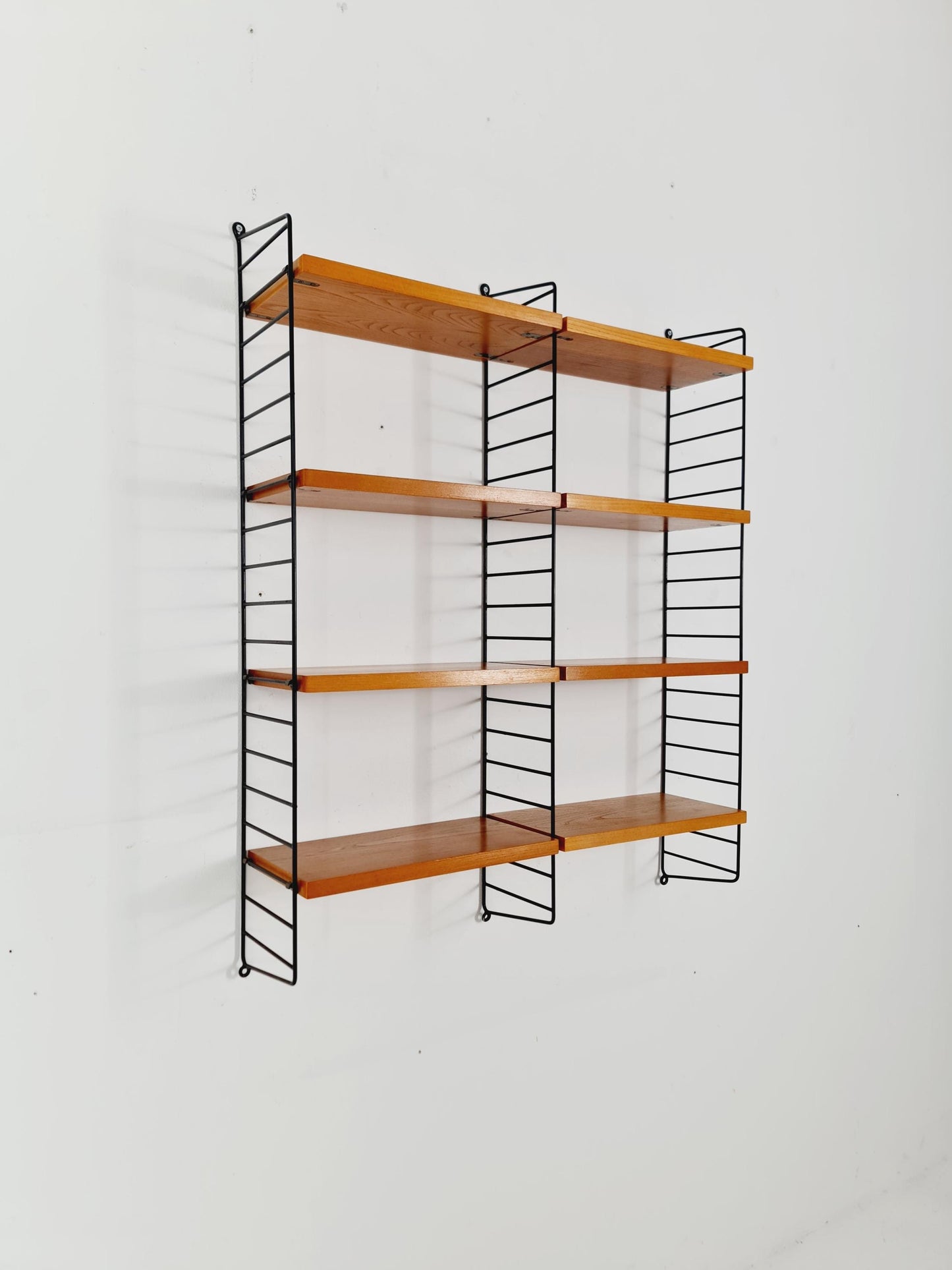 Original MCM Ash shelving system - consists of black lacquered metal ladders, from string Stockholm 1960s