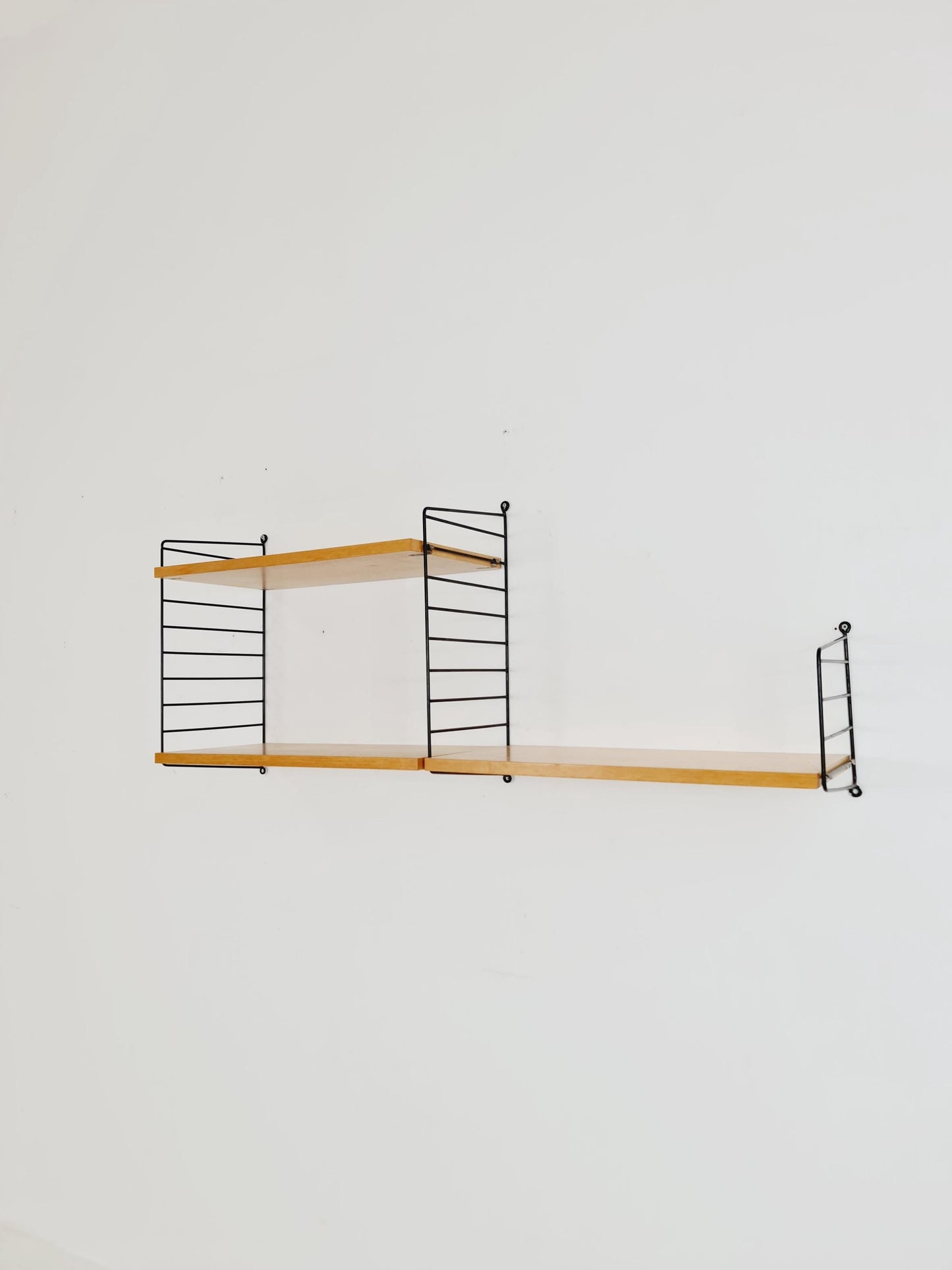 Original MCM Ash shelving system - consists of Black lacquered metal ladders, from string Stockholm 1960s
