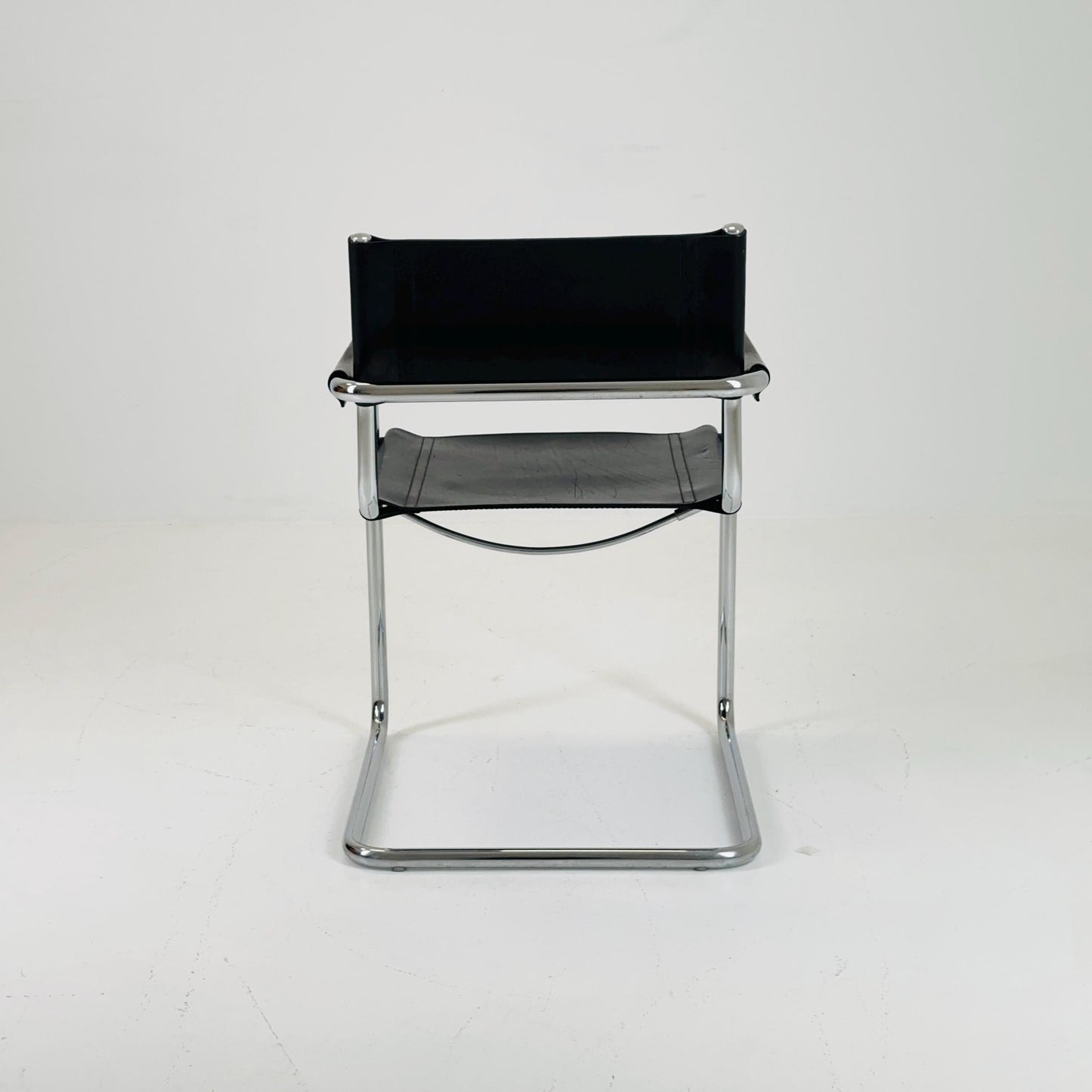 1 of 2 vintage B34 dark black color leather cantilevered chairs by Mart Stam for Jox Interni Italy 1980s