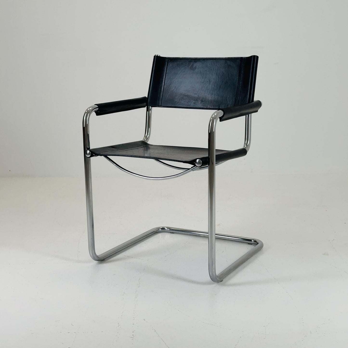 1 of 2 vintage B34 dark black color leather cantilevered chairs by Mart Stam for Jox Interni Italy 1980s