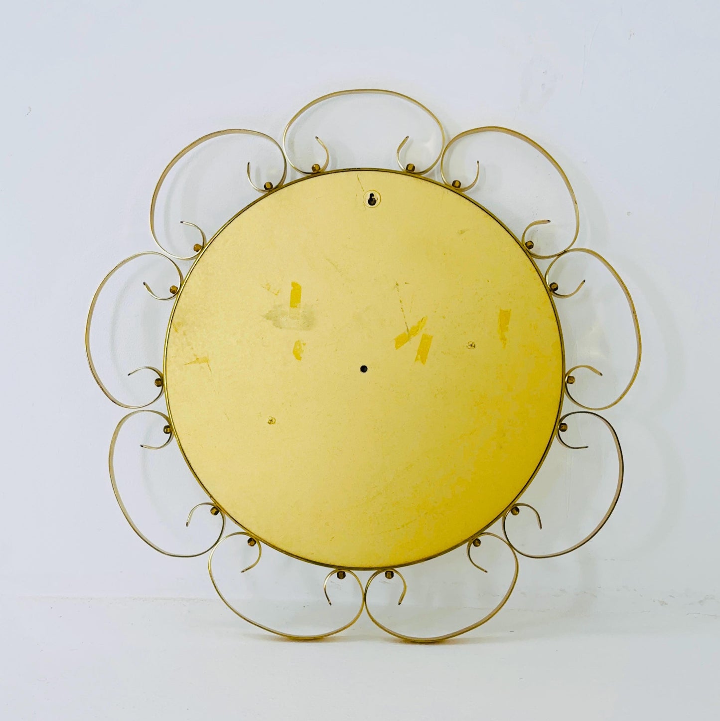 Mid century circle -shaped mirror with golden metal frame- 1960s Italy