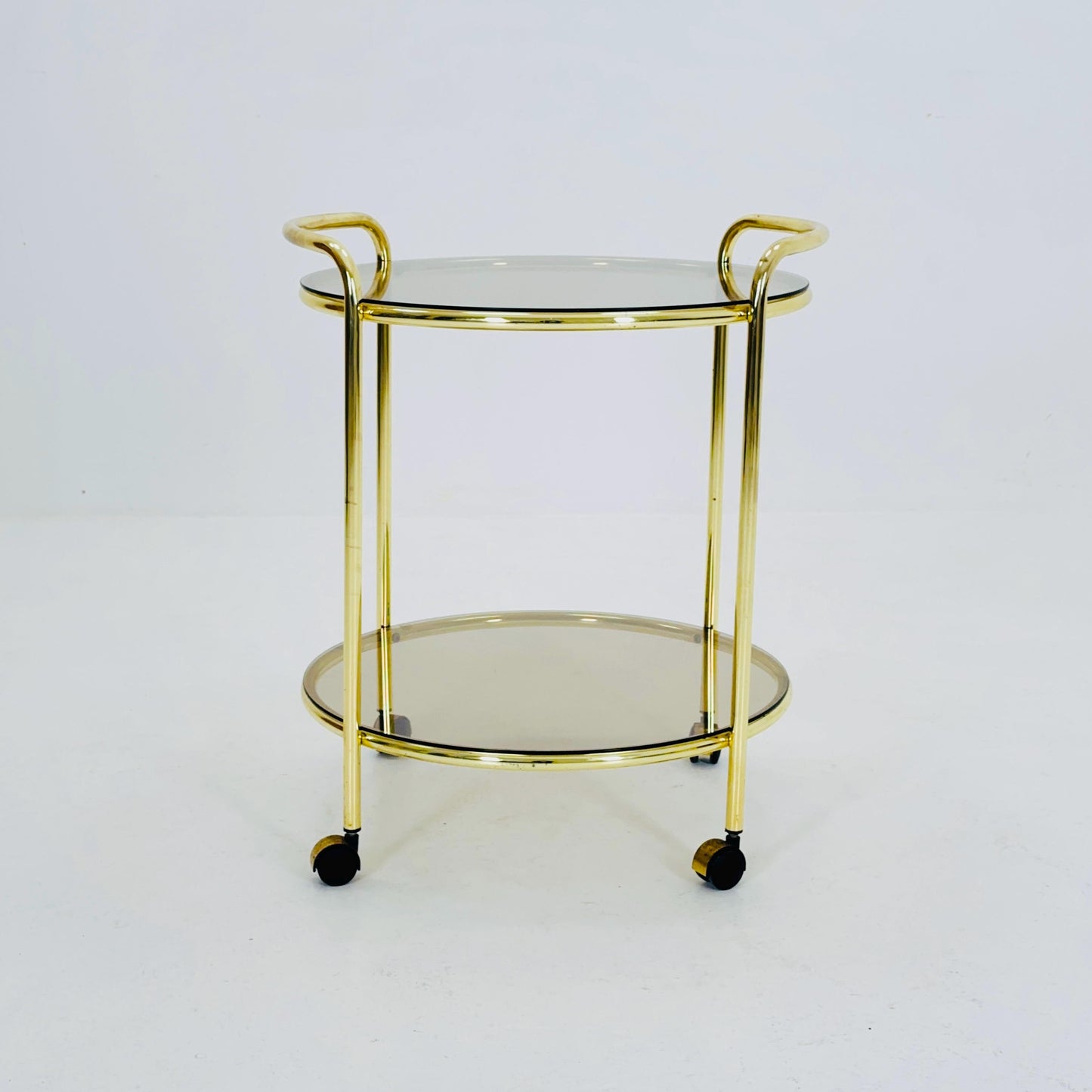 Mid Century Modern Bar/ Tea Cart Gold/Brass smoked Glass France 1970s .